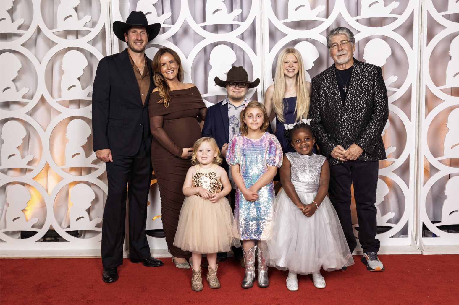 Russell and Kailey Dickerson with Randy Owen and St. Jude patients at the Country Cares seminar
